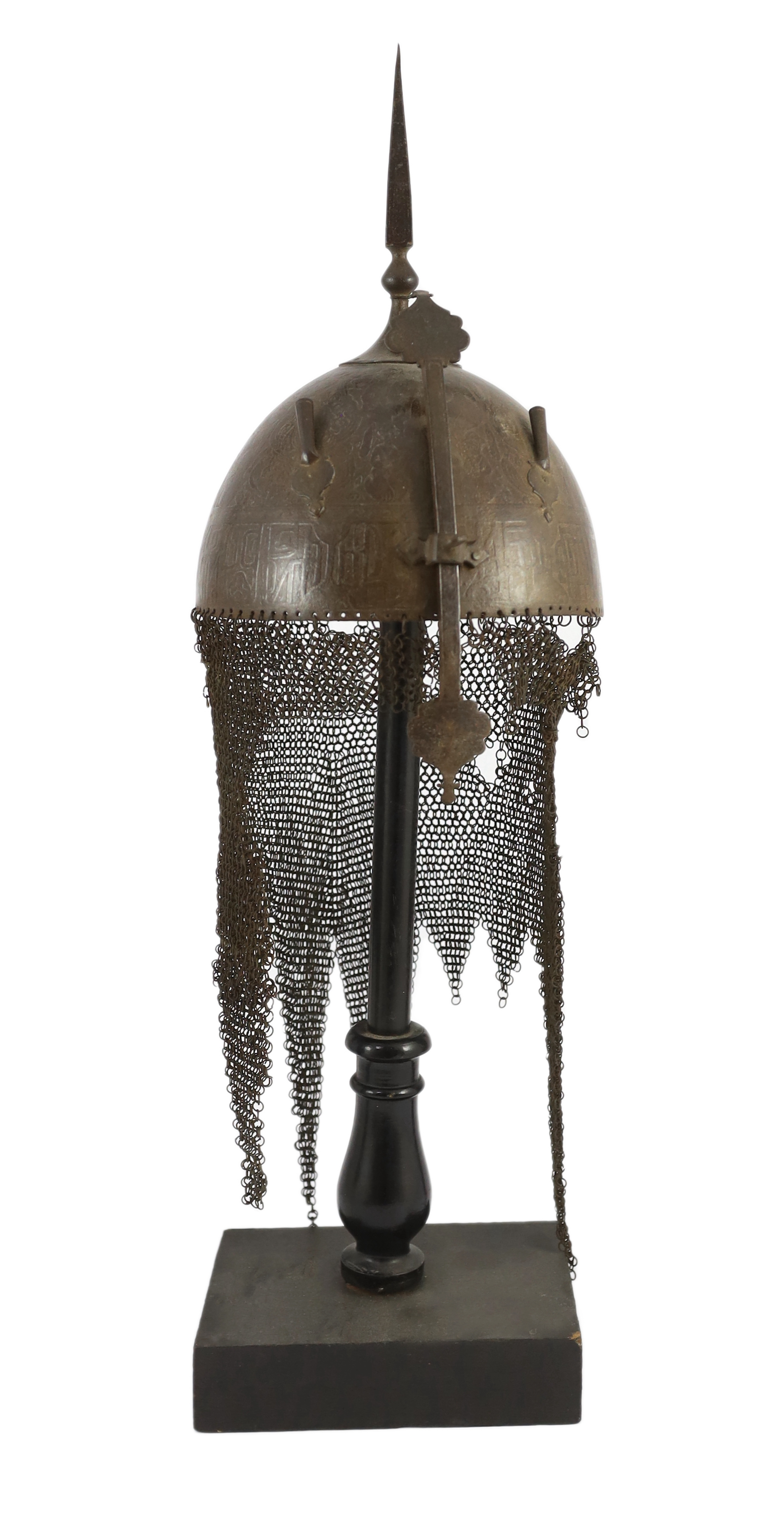 A 19th century Persian Kulah Khud, overall 60cm high, on ebonised stand including a section of human skull